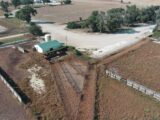 Aerial-of-processing-holding-pensloadoutworking-bldg